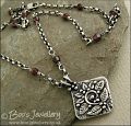 Silver and garnet necklace with square pendant