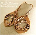 Teardrop shaped earrings featuring scrolls and leaves - RESERVED