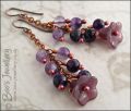 Chain dangle earrings with mauve beads on rosy red copper