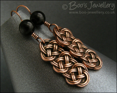 Antiqued copper and onyx knot earrings