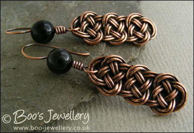 Antiqued copper and onyx knot earrings