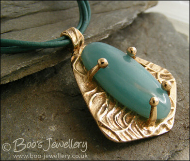 Bronze and Amazonite pendant on leather