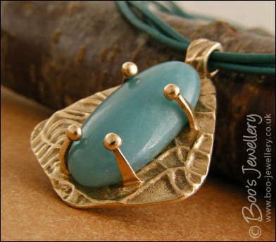 Bronze and Amazonite pendant on leather