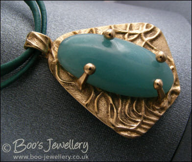 Bronze and Amazonite pendant on leather