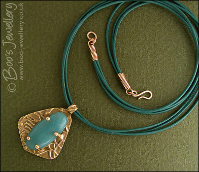 Bronze and Amazonite pendant on leather