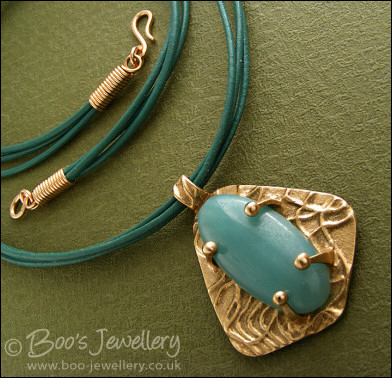 Bronze and Amazonite pendant on leather