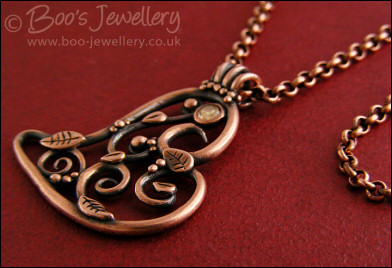 Filigree heart pendant with Champagne CZ stone