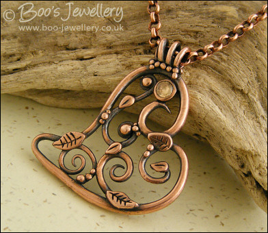 Filigree heart pendant with Champagne CZ stone