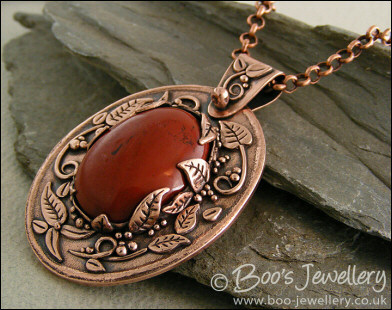 Red jasper cabochon and copper leaf pendant set
