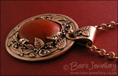 Red jasper cabochon and copper leaf pendant set