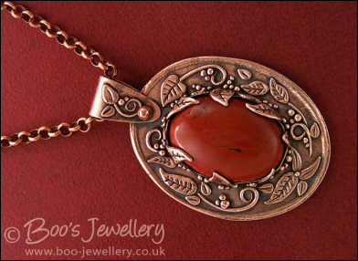 Red jasper cabochon and copper leaf pendant set