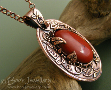 Red jasper cabochon and copper leaf pendant set