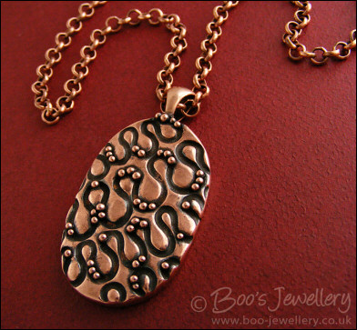 Textured copper pendant - twiddles and balls