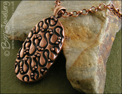 Textured copper pendant - twiddles and balls