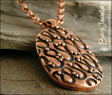 Textured copper pendant - twiddles and balls