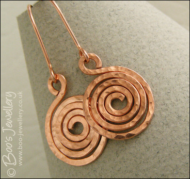 Hammered texture shiny copper spiral earrings