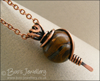 Tiger Iron and copper wire wrapped pendant
