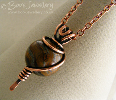 Tiger Iron and copper wire wrapped pendant