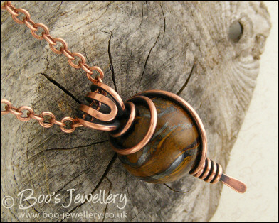 Tiger Iron and copper wire wrapped pendant