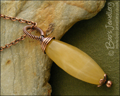 Honey quartz and antiqued copper wire wrapped pendant
