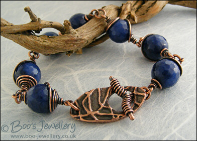 Deep blue faceted Jade bead and copper toggle bracelet