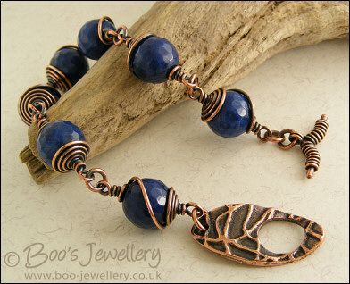 Deep blue faceted Jade bead and copper toggle bracelet