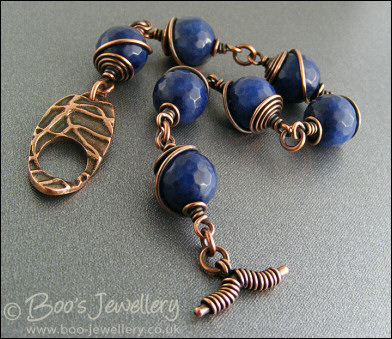 Deep blue faceted Jade bead and copper toggle bracelet