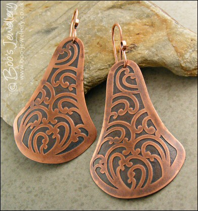 Fan shaped etched copper earrings with scroll design