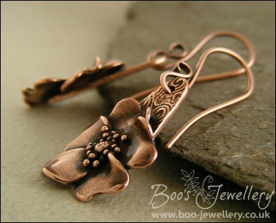 Wild rose hand sculpted copper earrings