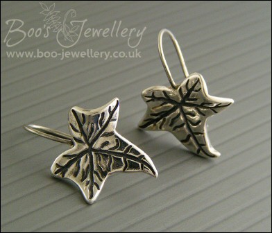 Solid silver one piece ivy leaf drop earrings with cubic zirconium