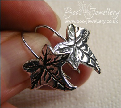 Solid silver one piece ivy leaf drop earrings with cubic zirconium