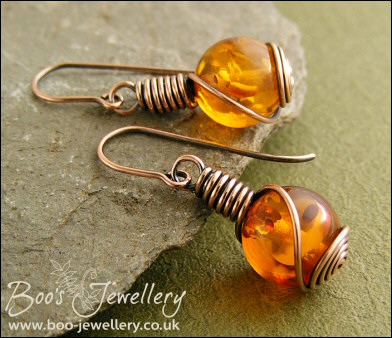 Faux amber and antiqued copper rosebud knot earrings