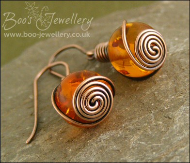 Faux amber and antiqued copper rosebud knot earrings