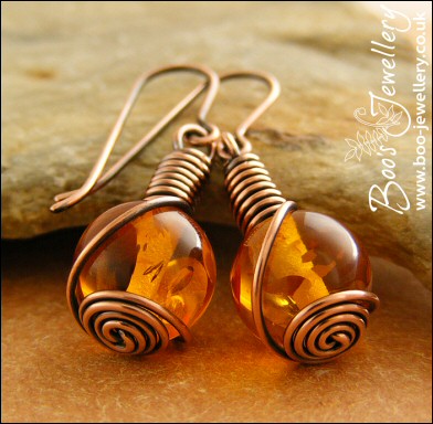 Faux amber and antiqued copper rosebud knot earrings
