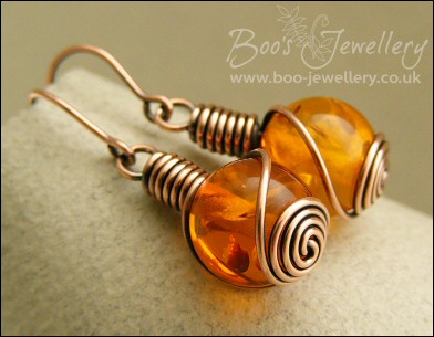 Faux amber and antiqued copper rosebud knot earrings