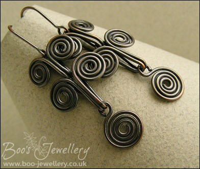 Egyptian coil antiqued copper earrings