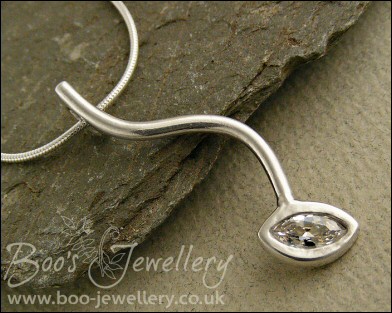 Silver curve pendant set with marquise shaped cubic zirconia
