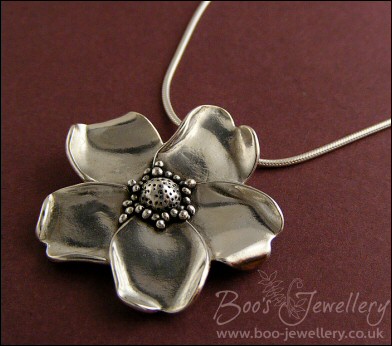 Pure solid silver hand sculpted wild rose pendant