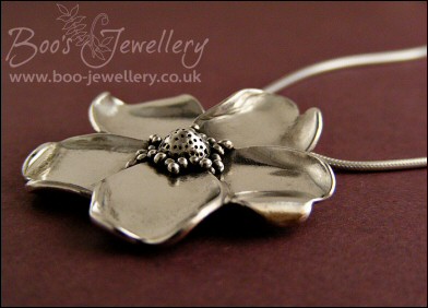 Pure solid silver hand sculpted wild rose pendant