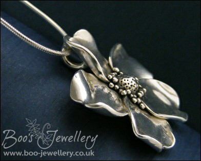Pure solid silver hand sculpted wild rose pendant