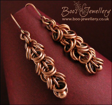 Antiqued copper double shaggy loops earrings