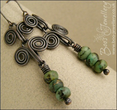Darkly oxed Egyptian scroll and African turquoise earrings