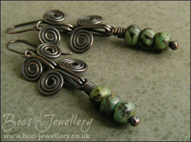 Darkly oxed Egyptian scroll and African turquoise earrings