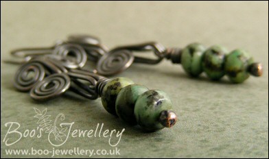Darkly oxed Egyptian scroll and African turquoise earrings