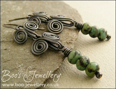 Darkly oxed Egyptian scroll and African turquoise earrings