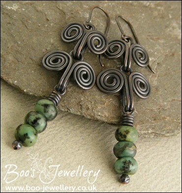 Darkly oxed Egyptian scroll and African turquoise earrings
