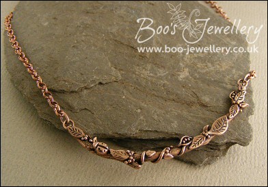 Twig necklace hand sculpted with leaves, seed pods and berries