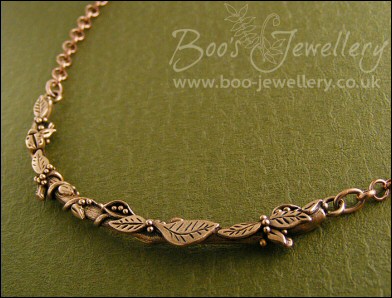Twig necklace hand sculpted with leaves, seed pods and berries