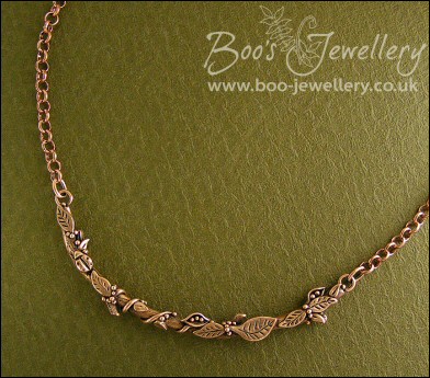 Twig necklace hand sculpted with leaves, seed pods and berries