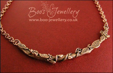 Twig necklace hand sculpted with leaves, seed pods and berries